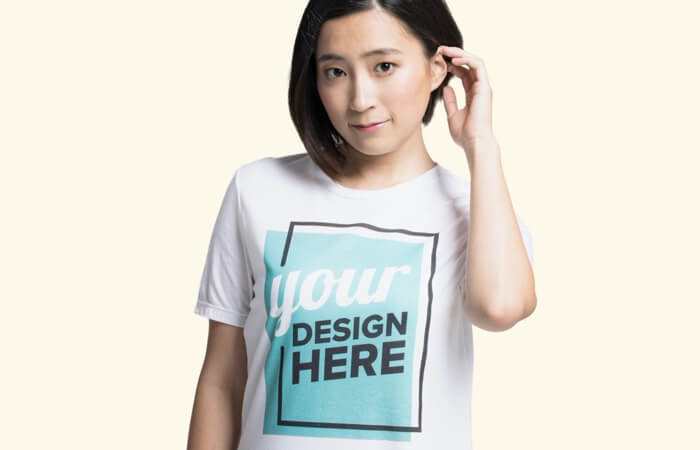 a woman in a t-shirt with "your design here" image